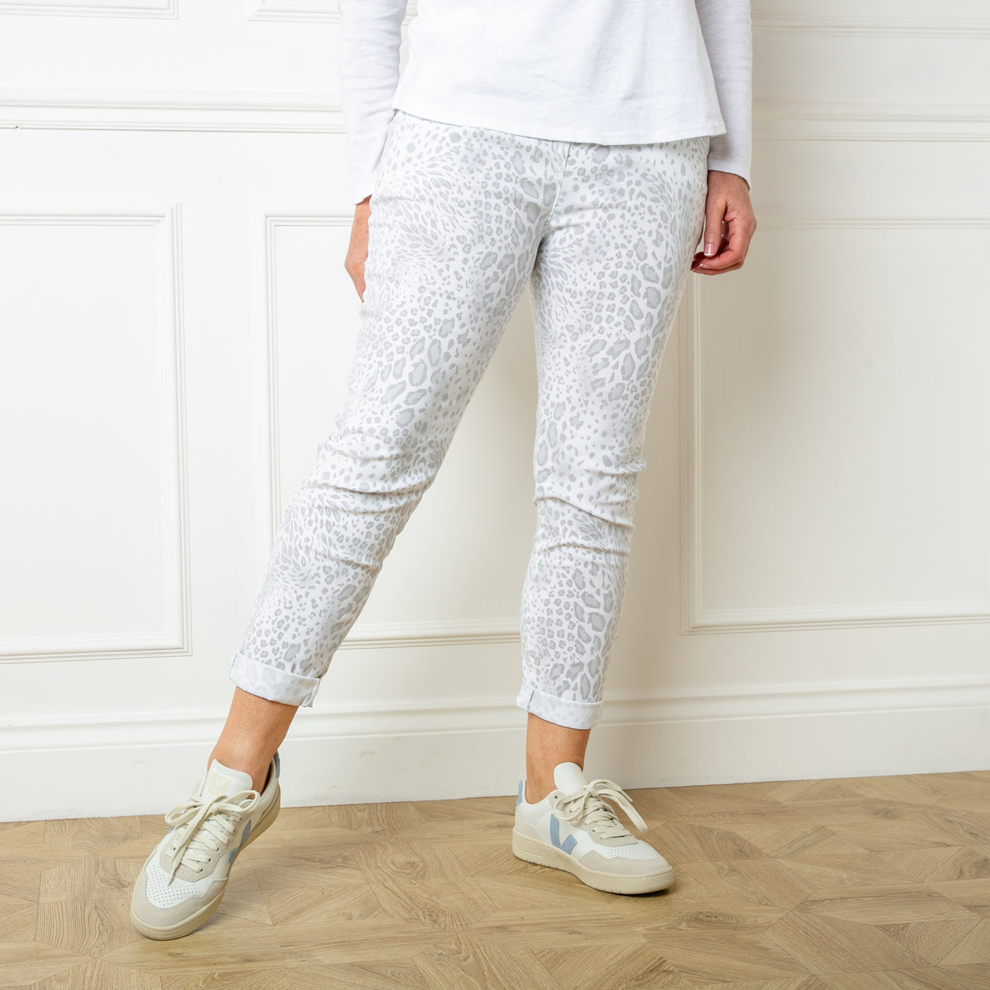 The white Animal Print Stretch Trousers in a fun leopard cheetah print pattern